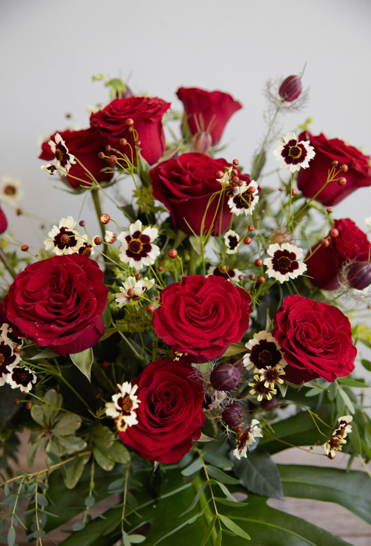 Vased Red Roses With A Twist