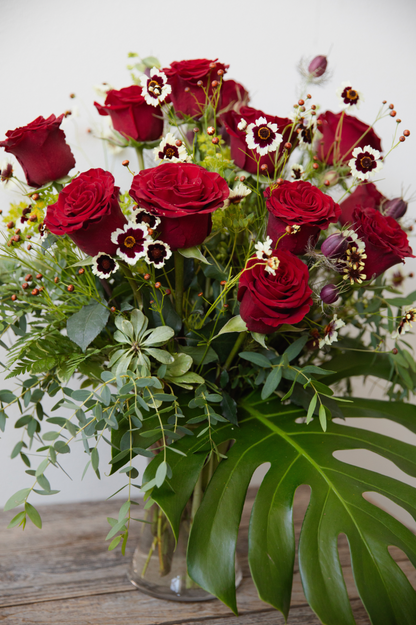 Vased Red Roses With A Twist